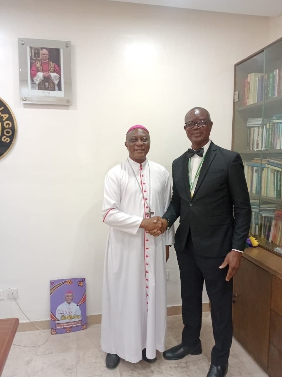 Chairman of the fundraising and sponsorship sub committee, Sir Ralph Karieren and the Archbishop Martins